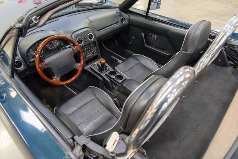 Illustration for article titled I Dunno About This 1997 Miata That's Been 'Converted' Into A 1965 Mustang